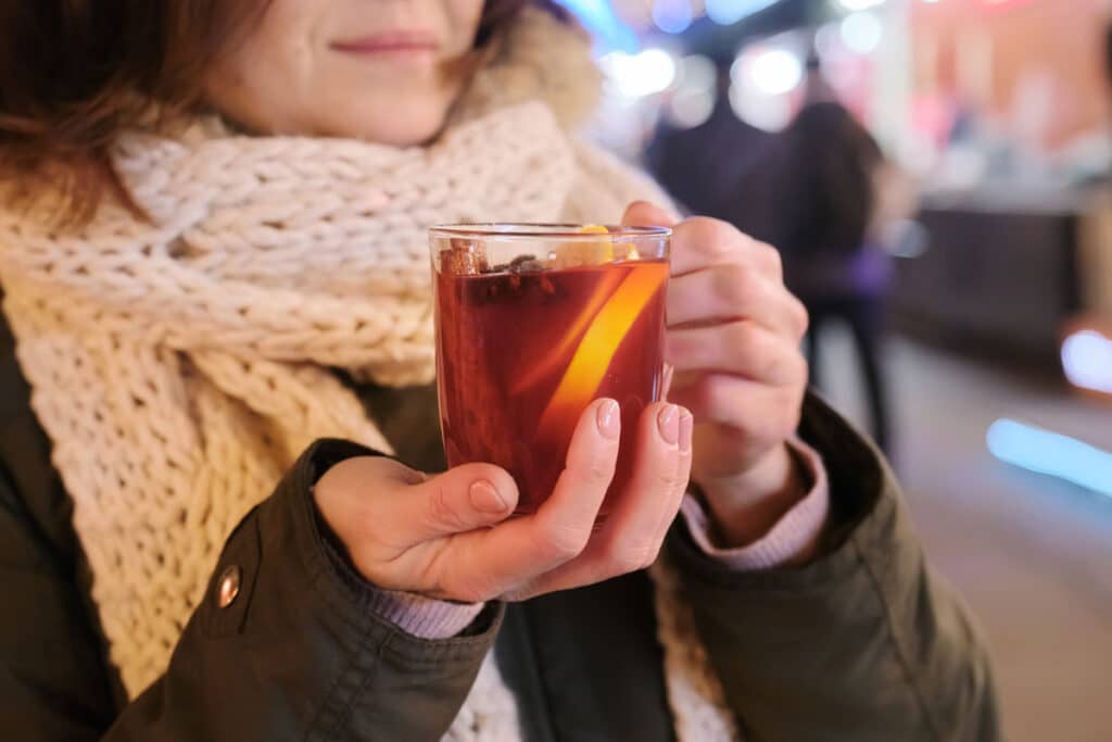 woman having tea in healthy winter